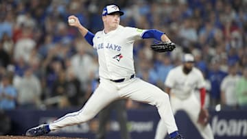 Oct 19, 2025; Toronto, Ontario, CAN; Toronto Blue Jays pitcher Louis Varland (77) pitches against the Seattle Mariners in the sixth inning during game six of the ALCS round for the 2025 MLB playoffs at Rogers Centre.