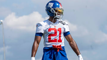 New York Giants cornerback Paulson Adebo (21) warms up during day one of the New York Giants training camp at Quest Diagnostics Giants Training Center in East Rutherford on Wednesday, July 23, 2025.