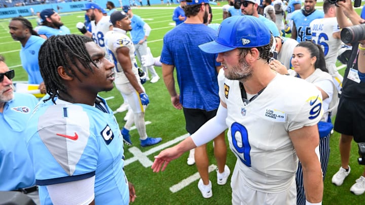 Sep 14, 2025; Nashville, Tennessee, USA; Tennessee Titans quarterback Cameron Ward (1) and Los Angeles Rams quarterback Matthew Stafford (9) talk post game at Nissan Stadium. Mandatory Credit: Steve Roberts-Imagn Images Sep 14, 2025; Nashville, Tennessee, USA; Tennessee Titans quarterback Cameron Ward (1) and Los Angeles Rams quarterback Matthew Stafford (9) talk post game at Nissan Stadium. Mandatory Credit: Steve Roberts-Imagn Images