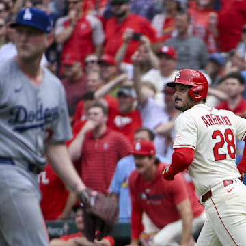 Jun 7, 2025; St. Louis, Missouri, USA;  St. Louis Cardinals pinch hitter Nolan Arenado (28) looks on after hitting a walk-off one run single off of Los Angeles Dodgers relief pitcher Ben Casparius (78) during the ninth inning at Busch Stadium. Mandatory Credit: Jeff Curry-Imagn Images