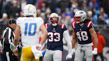 Dec 28, 2024; Foxborough, Massachusetts, USA; New England Patriots linebacker Anfernee Jennings (33) reacts after a play against the Los Angeles Chargers in the first quarter at Gillette Stadium. Mandatory Credit: David Butler II-Imagn Images