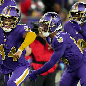 Nov 7, 2024; Baltimore, Maryland, USA; Baltimore Ravens cornerback Marlon Humphrey (44) reacts after forcing a fumble during third quarter against the Cincinnati Bengals at M&T Bank Stadium. Mandatory Credit: Mitch Stringer-Imagn Images