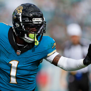Jacksonville Jaguars running back Travis Etienne Jr. rushes during a game.