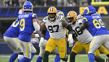 Green Bay Packers defensive tackles Kenny Clark and Colby Wooden