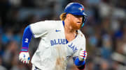 Blue Jays veteran Justin Turner runs to first base during a game against the New York Yankees at Rogers Centre. 