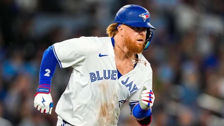 Blue Jays veteran Justin Turner runs to first base during a game against the New York Yankees at Rogers Centre. 