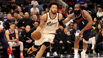 Mar 5, 2025; Inglewood, California, USA; Detroit Pistons guard Cade Cunningham (2) drives against LA Clippers guard James Harden (1) : Jason Parkhurst-Imagn Images