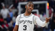 Nov 4, 2024; Inglewood, California, USA; San Antonio Spurs guard Chris Paul (3) reacts during the second half at Intuit Dome. Mandatory Credit: Gary A. Vasquez-Imagn Images