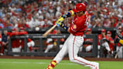 Sep 19, 2025; St. Louis, Missouri, USA;  St. Louis Cardinals left fielder Lars Nootbaar (21) hits a one run single against the Milwaukee Brewers during the first inning at Busch Stadium. Mandatory Credit: Jeff Curry-Imagn Images