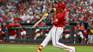Sep 19, 2025; St. Louis, Missouri, USA;  St. Louis Cardinals left fielder Lars Nootbaar (21) hits a one run single against the Milwaukee Brewers during the first inning at Busch Stadium. Mandatory Credit: Jeff Curry-Imagn Images