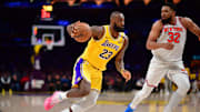 Los Angeles Lakers forward LeBron James moves to the basket against New York Knicks center Karl-Anthony Towns during the second half at Crypto.com Arena. 