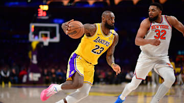 Los Angeles Lakers forward LeBron James moves to the basket against New York Knicks center Karl-Anthony Towns during the second half at Crypto.com Arena. 