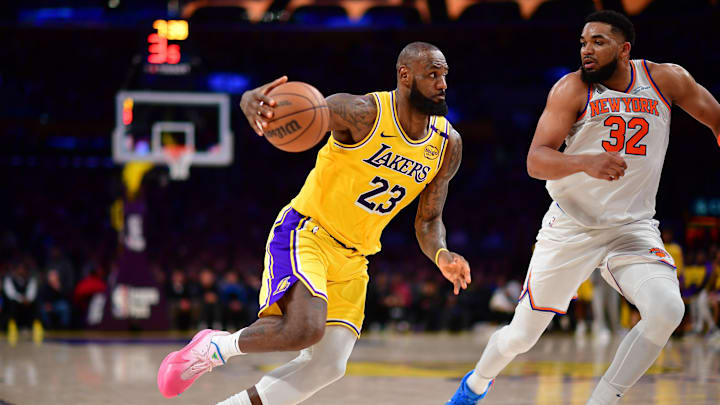 Los Angeles Lakers forward LeBron James moves to the basket against New York Knicks center Karl-Anthony Towns during the second half at Crypto.com Arena. 