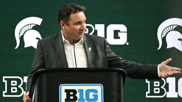 Michigan State Spartans head coach Jonathan Smith speaks to the media during the Big 10 football media day at Lucas Oil Stadi