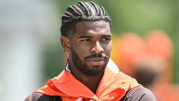 Jun 10, 2025; Berea, OH, USA; Cleveland Browns quarterback Shedeur Sanders (12) walks off the field during minicamp at CrossCountry Mortgage Campus. Mandatory Credit: Ken Blaze-Imagn Images