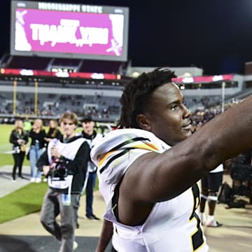 Nov 23, 2024; Starkville, Mississippi, USA; Missouri Tigers defensive end Zion Young (9) reacts after a game against the Mississippi State Bulldogs at Davis Wade Stadium at Scott Field. Mandatory Credit: Matt Bush-Imagn Images