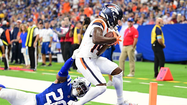 Denver Broncos wide receiver Marvin Mims Jr. (19) scores a touchdown against the Indianapolis Colts.