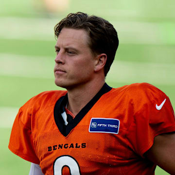 Cincinnati Bengals quarterback Joe Burrow (9) runs onto the field during Bengals Camp practice at Paycor Stadium in Cincinnati on Aug. 2, 2025.