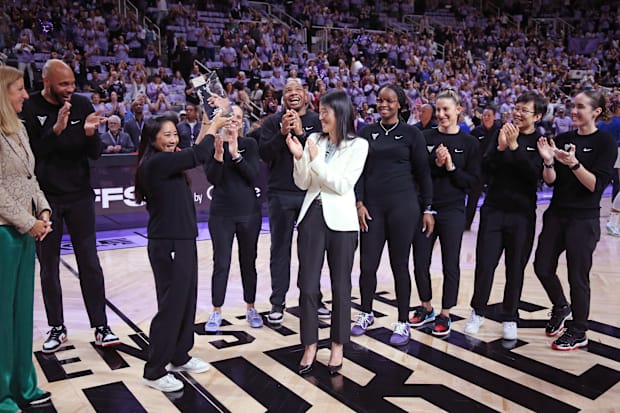 Golden State Valkyries head coach Natalie Nakase receives the Coach of the Year Award. 