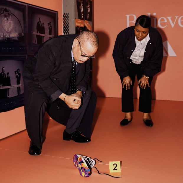 Ice-T and Veda Howard pose for a photo at an adidas event.