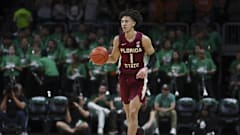 Jalen Warley handles the ball during the Florida State men's basketball game against Miami at Watsco Center. 