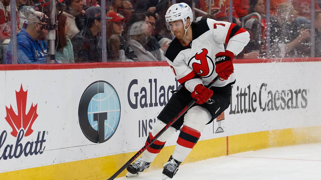 Apr 11, 2026; Detroit, Michigan, USA;  New Jersey Devils defenseman Dougie Hamilton (7) skates with the puck in the second period against the Detroit Red Wings at Little Caesars Arena. Mandatory Credit: Rick Osentoski-Imagn Images