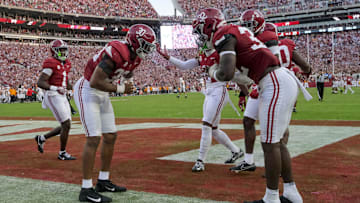 Oct 21, 2023; Tuscaloosa, Alabama, USA;  Alabama Crimson Tide linebacker Jihaad Campbell (30) and Alabama Crimson Tide linebacker Deontae Lawson (32) celebrates after Campbell scooped up a fumble and scored at Bryant-Denny Stadium. Alabama defeated Tennessee 34-20. Mandatory Credit: Gary Cosby Jr.-USA TODAY Sports