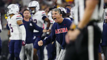 Arizona head coach Brent Brennan celebrates during a game against Arizona State at Mountain America Stadium in Tempe on Nov. 28, 2025.