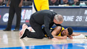 Jun 22, 2025; Oklahoma City, Oklahoma, USA; Indiana Pacers guard Tyrese Haliburton (0) reacts after suffering an injury during the first quarter against the Oklahoma City Thunder during game seven of the 2025 NBA Finals at Paycom Center. Mandatory Credit: Kyle Terada-Imagn Images