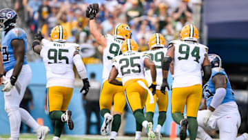 Sep 22, 2024; Nashville, Tennessee, USA;  Green Bay Packers defensive end Lukas Van Ness (90) celebrates the fumble recovery with his teammates against the Tennessee Titans during the first half at Nissan Stadium. Mandatory Credit: Steve Roberts-Imagn Images
