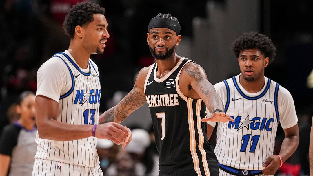 Mar 16, 2026; Atlanta, Georgia, USA; Atlanta Hawks guard Nickeil Alexander-Walker (7) reacts with Orlando Magic guard Jett Howard (13) at the end of the game at State Farm Arena. Mandatory Credit: Dale Zanine-Imagn Images