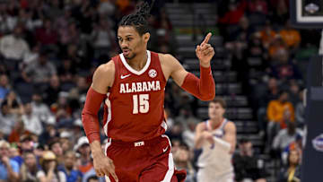 Mar 15, 2025; Nashville, TN, USA;  Alabama Crimson Tide forward Jarin Stevenson (15) reacts after a made three point basket  against the Florida Gators during the first half at Bridgestone Arena. Mandatory Credit: Steve Roberts-Imagn Images