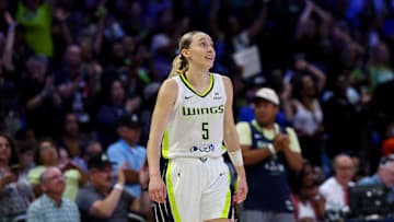 Jun 17, 2025; Arlington, Texas, USA;  Dallas Wings guard Paige Bueckers (5) reacts during the second half against the Golden State Valkyries at College Park Center. Mandatory Credit: Kevin Jairaj-Imagn Images