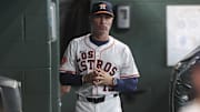 Sep 20, 2025; Houston, Texas, USA; Houston Astros manager Joe Espada (19) walks in the dugout before the game against the Seattle Mariners at Daikin Park.