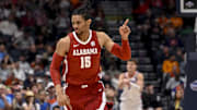 Mar 15, 2025; Nashville, TN, USA;  Alabama Crimson Tide forward Jarin Stevenson (15) reacts after a made three point basket  against the Florida Gators during the first half at Bridgestone Arena. Mandatory Credit: Steve Roberts-Imagn Images