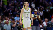 Jun 17, 2025; Arlington, Texas, USA;  Dallas Wings guard Paige Bueckers (5) reacts during the second half against the Golden State Valkyries at College Park Center. Mandatory Credit: Kevin Jairaj-Imagn Images