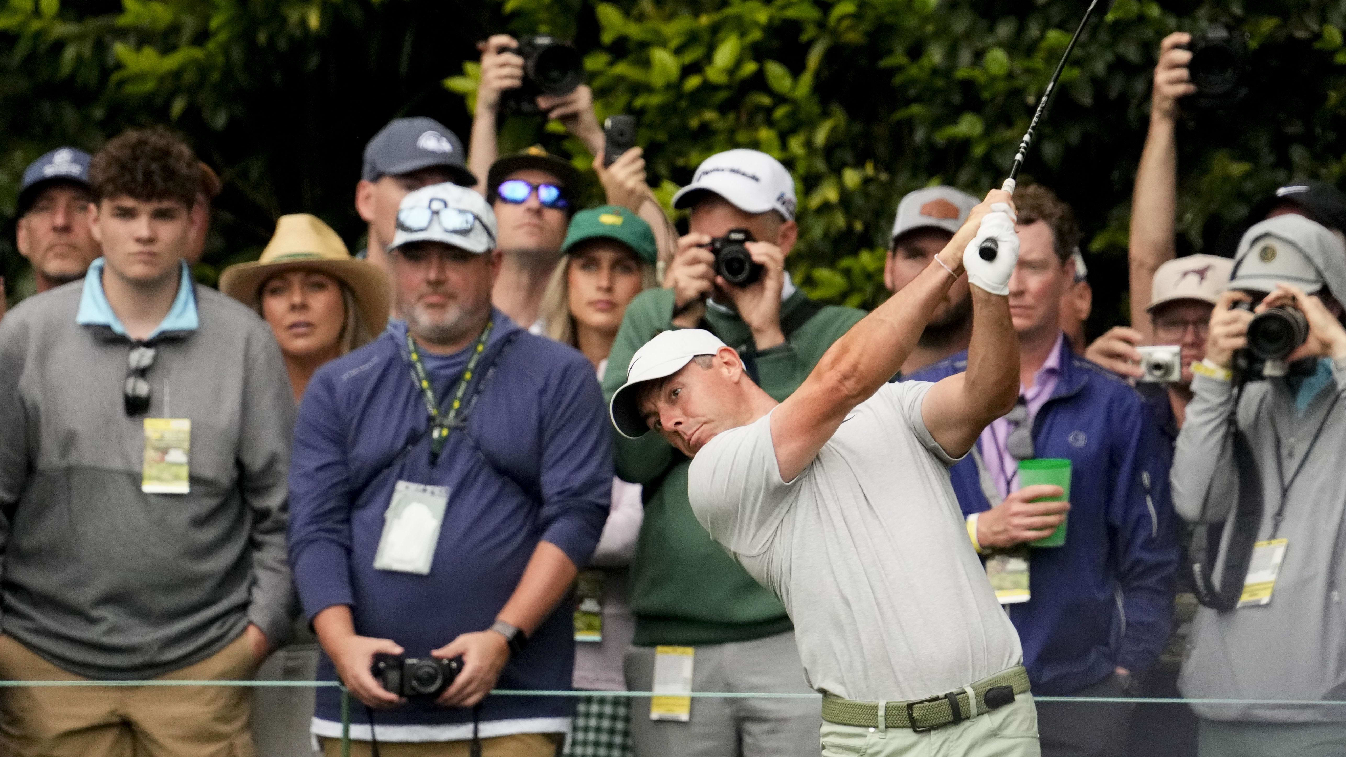 Rory McIlroy watches a shot during a practice round for the 2024 Masters.