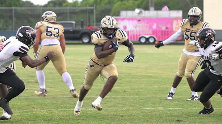 West Boca Raton running back Javian Mallory bursts through the hole for his second touchdown of a three-score performance against Palm Beach Central on Aug. 28, 2025.