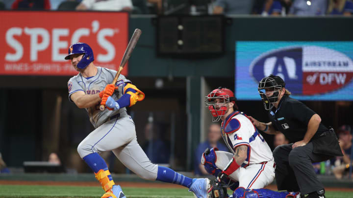Jun 18, 2024; Arlington, Texas, USA; New York Mets first base Pete Alonso (20) doubles in the go-ahead run in the ninth inning against the Texas Rangers at Globe Life Field. Mandatory Credit: Tim Heitman-USA TODAY Sports