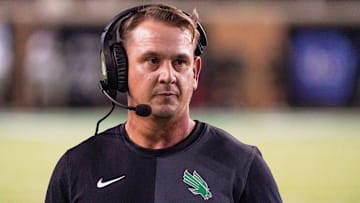 North Texas Mean Green coach Eric Morris stands on the sidelines against the South Florida Bulls during the second half of a game at DATCU Stadium.