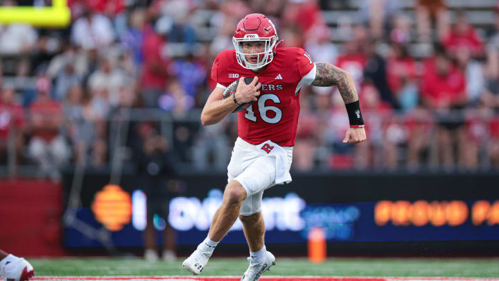 Aug 29, 2024; Piscataway, New Jersey, USA; Rutgers Scarlet Knights quarterback Athan Kaliakmanis (16) carries the ball during the first half against the Howard Bison at SHI Stadium. Mandatory Credit: Vincent Carchietta-USA TODAY Sports