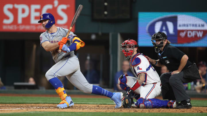 Jun 18, 2024; Arlington, Texas, USA; New York Mets first base Pete Alonso (20) doubles in the go-ahead run in the ninth inning against the Texas Rangers at Globe Life Field. Mandatory Credit: Tim Heitman-USA TODAY Sports