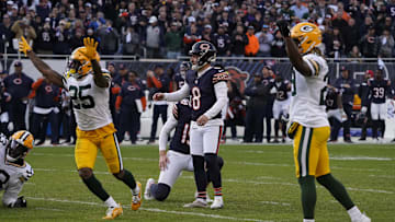 Nov 17, 2024; Chicago, Illinois, USA; Chicago Bears place kicker Cairo Santos (8) has his field goal blocked at the end of the game as the Green Bay Packers celebrate at Soldier Field.