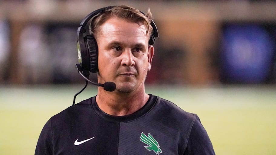 North Texas Mean Green head coach Eric Morris stands on the sidelines against the South Florida Bulls.