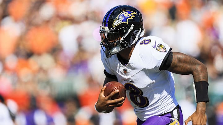 Oct 6, 2024; Cincinnati, Ohio, USA; Baltimore Ravens quarterback Lamar Jackson (8) runs with the ball against the Cincinnati Bengals in the first half at Paycor Stadium. Mandatory Credit: Katie Stratman-Imagn Images
