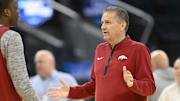Arkansas Razorbacks coach John Calipari (right) talks to guard Johnell Davis (1) during NCAA Tournament West Regional Practice at Chase Center. 