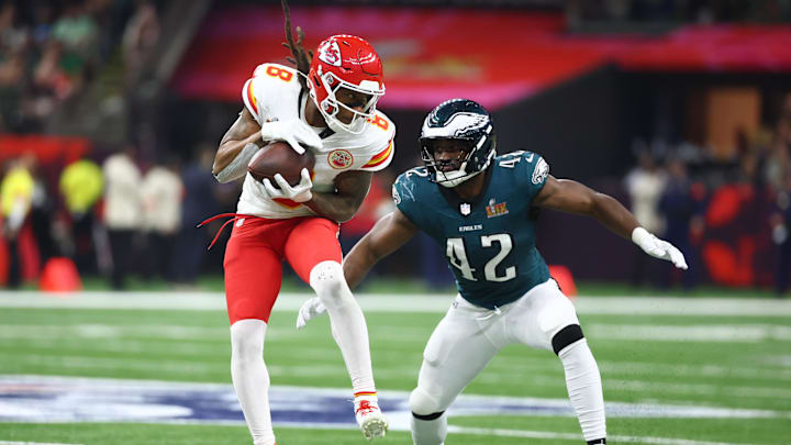 Kansas City Chiefs wide receiver DeAndre Hopkins catches a pass against Philadelphia Eagles linebacker Oren Burks Kansas City Chiefs wide receiver DeAndre Hopkins catches a pass against Philadelphia Eagles linebacker Oren Burks