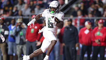 Noah Whittington bolted around the left side for a 68-yard touchdown run behind blocks from Isaiah World and Jordon Davison Saturday against Rutgers. He carried the ball 11 times for 125 yards, two TDs and also caught a five-yard touchdown pass.