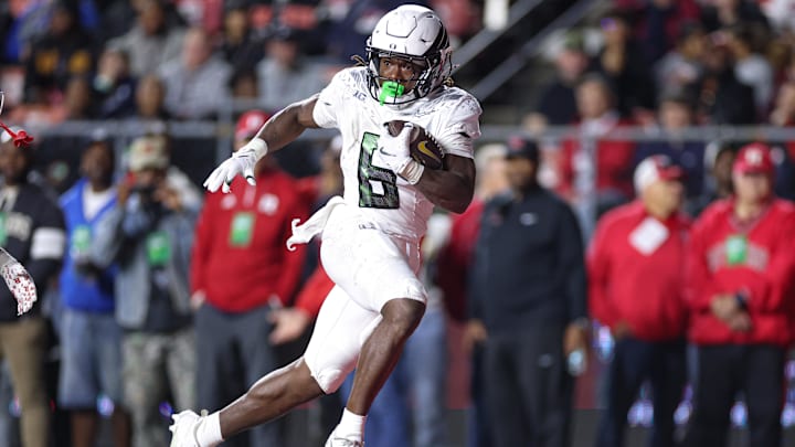 Noah Whittington bolted around the left side for a 68-yard touchdown run behind blocks from Isaiah World and Jordon Davison Saturday against Rutgers. He carried the ball 11 times for 125 yards, two TDs and also caught a five-yard touchdown pass.