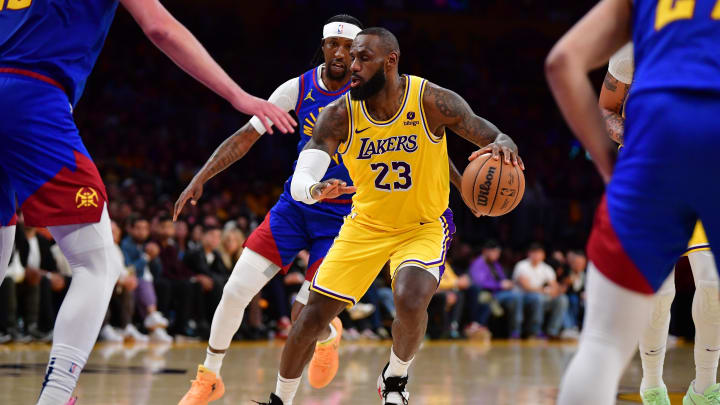 Apr 25, 2024; Los Angeles, California, USA; Los Angeles Lakers forward LeBron James (23) controls the ball against the Denver Nuggets during the second half in game three of the first round for the 2024 NBA playoffs at Crypto.com Arena. Mandatory Credit: Gary A. Vasquez-USA TODAY Sports